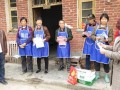 邵阳县罗城乡6000件围裙扮靓“四美农家”