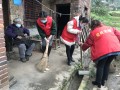 邵阳经开区组织党员先锋与志愿者进社区开展大扫除活动