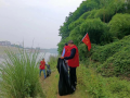 北塔区新滩镇街道新时代文明实践志愿服务大队开展“保护母亲河--爱水护水我先行”主题活动